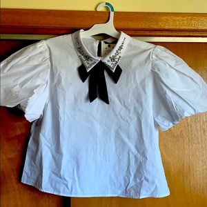 White puff sleeve detailed blouse